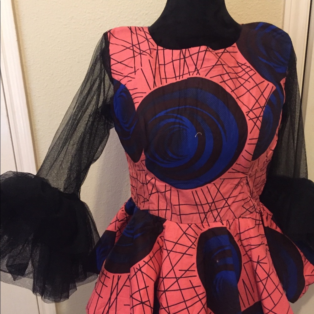 Peplum top with net puffed sleeves